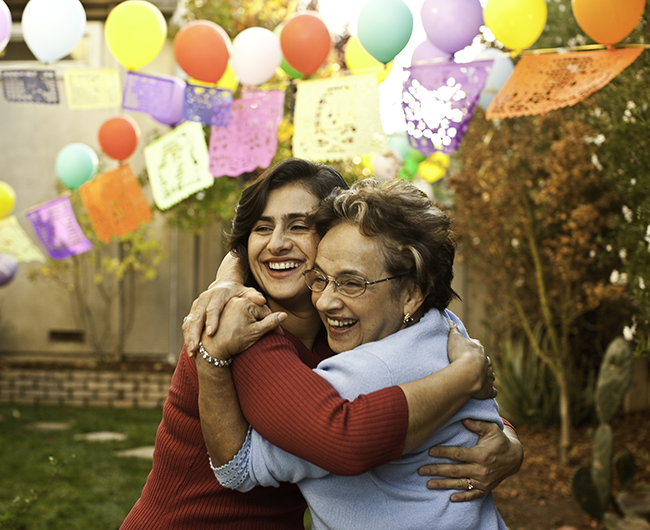 mom and daughter hugging