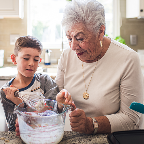 grandma and grandson cooking