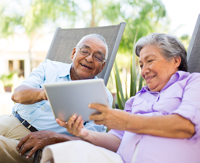 couple looking at tablet